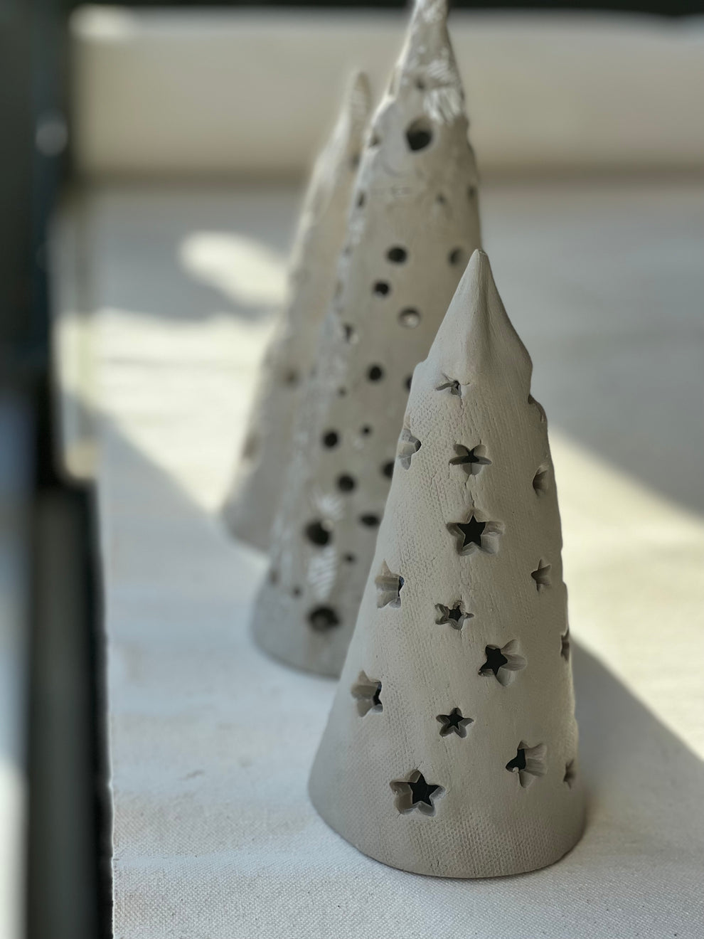 Holiday Tree Luminaries 2026 – Terracotta Pullman
